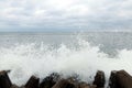 Breakwater with the strong water waves Royalty Free Stock Photo